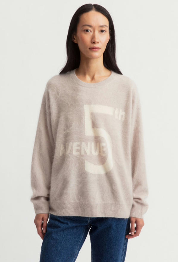 Full body studio look of light oat 18GG brushed cashmere graphic print loose crew neck sweater matched with blue jeans, fuzzy halo fleece cashmere casual everyday women knit pullover