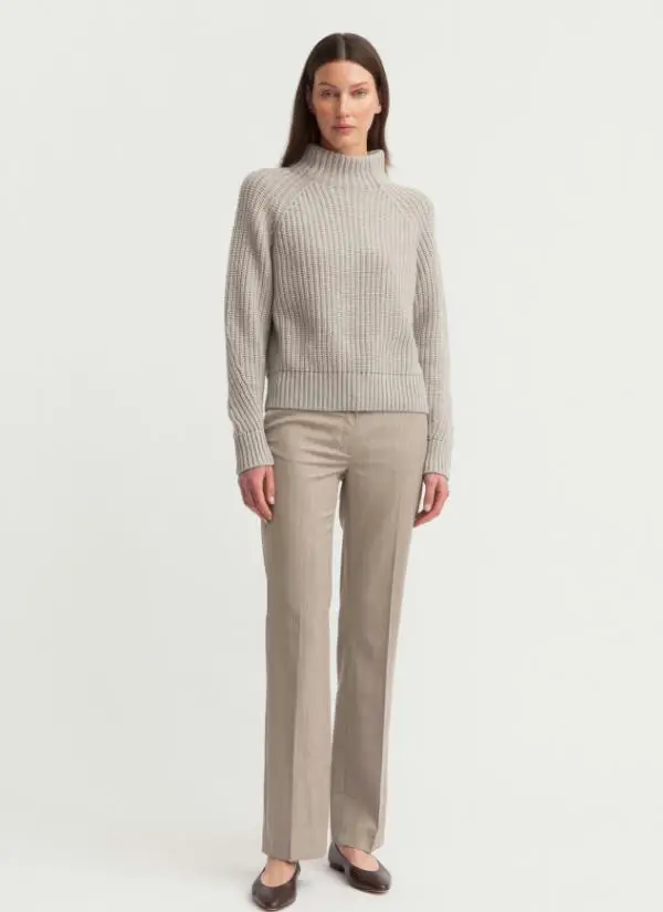 Front full studio fashion shot of light grey 5GG cashmere blend vertical rib mock neck sweater matched with beige straight leg wool trousers, slim ribbed turtleneck minimalist business casual women knit coordinate