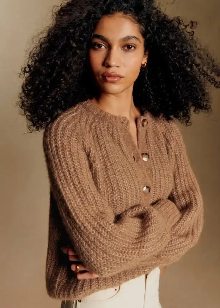 Model wearing a chunky camel mohair knit cardigan, showcasing the soft, fuzzy texture and luxurious warmth of premium OEM mohair knitwear.