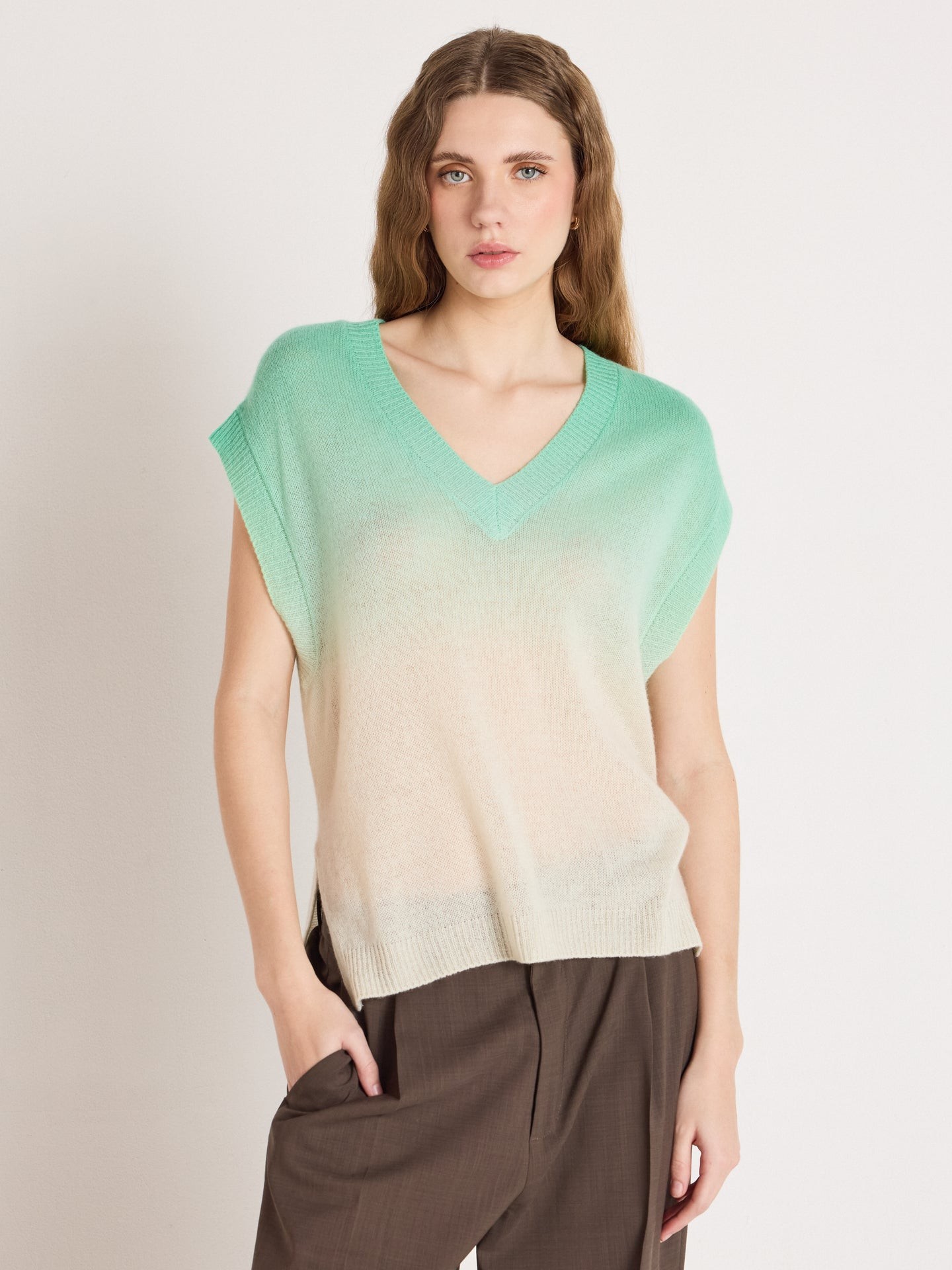 Studio model shot of gradient mint beige 12GG Washi yarn sleeveless V-neck knit top, lightweight sheer breathable Japanese paper fiber knit vest, summer casual layering women knitwear