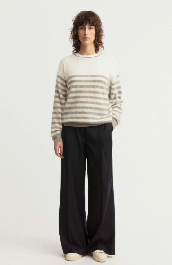 Full body studio fashion look of two-tone brushed cashmere striped crew neck sweater with black wide leg trousers, fuzzy halo fleece cashmere pullover minimalist neutral women autumn outfit
