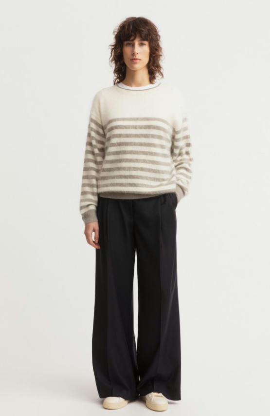 Full body studio fashion look of two-tone brushed cashmere striped crew neck sweater with black wide leg trousers, fuzzy halo fleece cashmere pullover minimalist neutral women autumn outfit